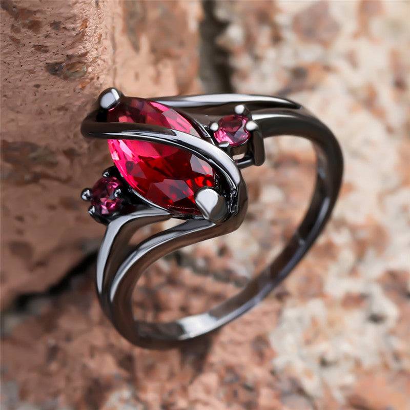 Ring: 14K Black Gold Red Leaf Crystal