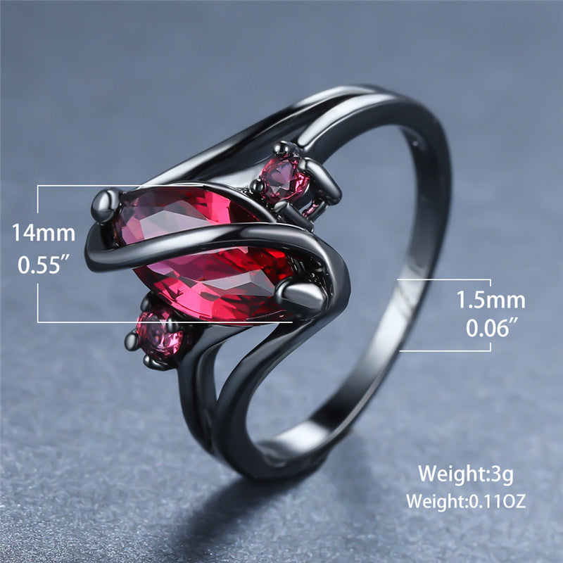 Ring: 14K Black Gold Red Leaf Crystal