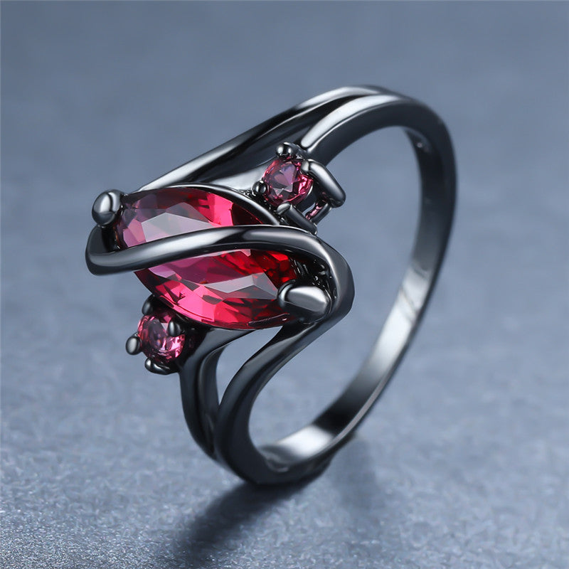 Ring: 14K Black Gold Red Leaf Crystal