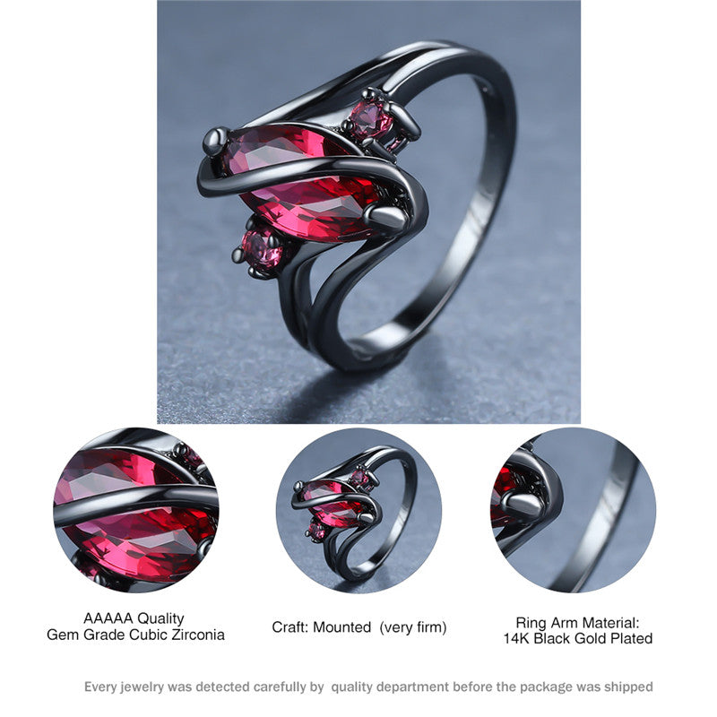 Ring: 14K Black Gold Red Leaf Crystal