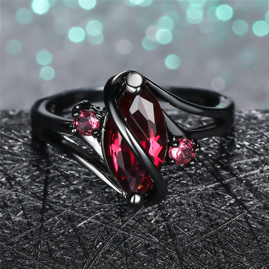 Ring: 14K Black Gold Red Leaf Crystal