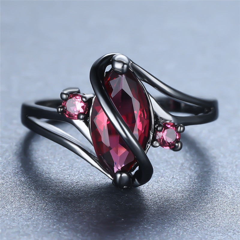 Ring: 14K Black Gold Red Leaf Crystal